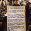 Is This The Largest Protest Sign To Ever Ride The Subway?